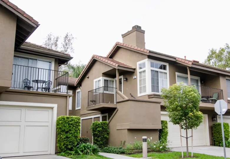 Balcony of the Villa in Laurelwood at Sycamore Canyon has Dinning tables and chiars with trees