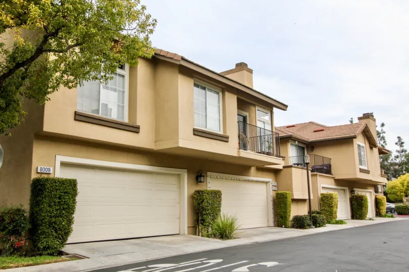 THE 8009 APARTMENT IN THE Laurelwood at Sycamore Canyon WITH THE BALCONI, PLANTS, SHUTTERS, THAR ROAD