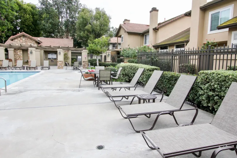 Enjoy our three heated salt water swimming pools and spas, resident clubhouse with kitchen
