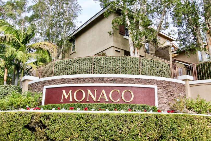 THE HOUSE IN THE MONACO WITH THE MONACO WALL, PLANTS, TREES