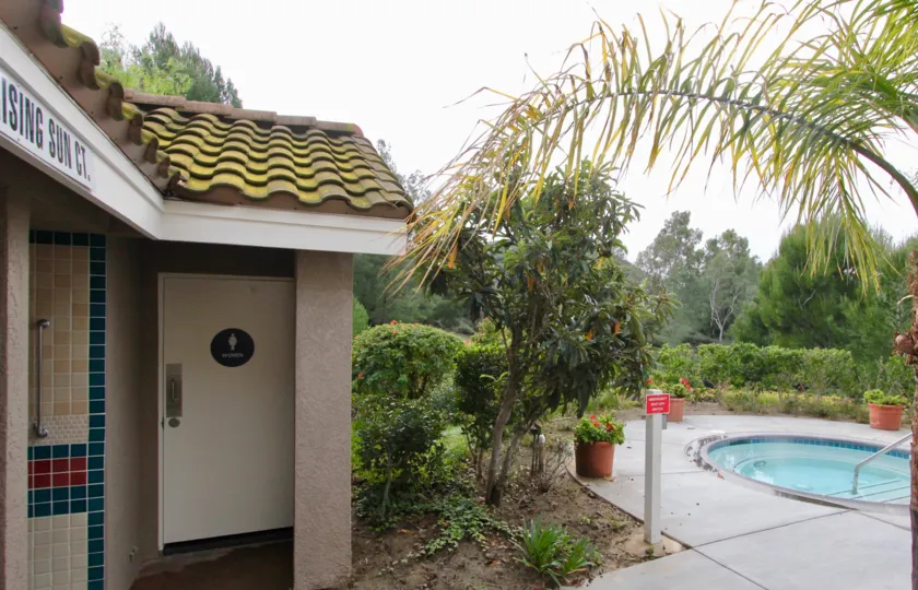 THE HOUSE IN THE VIEWPOINTE WITH THE SWIMMING POOL, PLANTS, TREES
