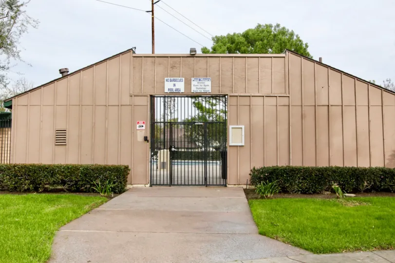 THE ENTRANCE WAY WITH BEAUTIFUL LAWN WITH PLANTS ARE IN THE CITY OF ANAHEIM HILLS