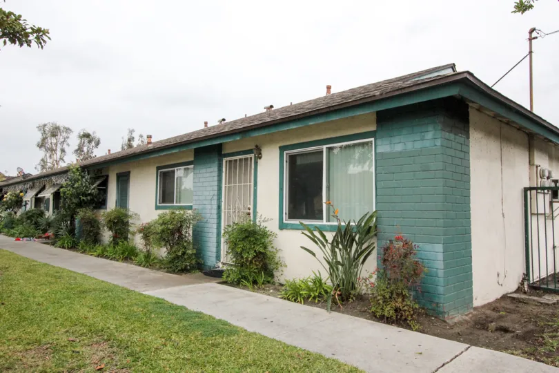 single family, attached homes with green brick and awnings at 1152 North West