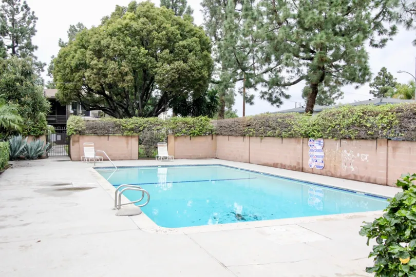 Crystal clear swimming pool at Anaheim Village I in Anaheim California.