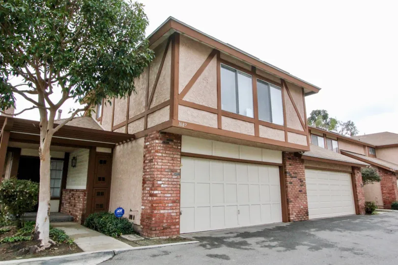 Beige brown home with brick sections in Bramble Village, Anaheim CA