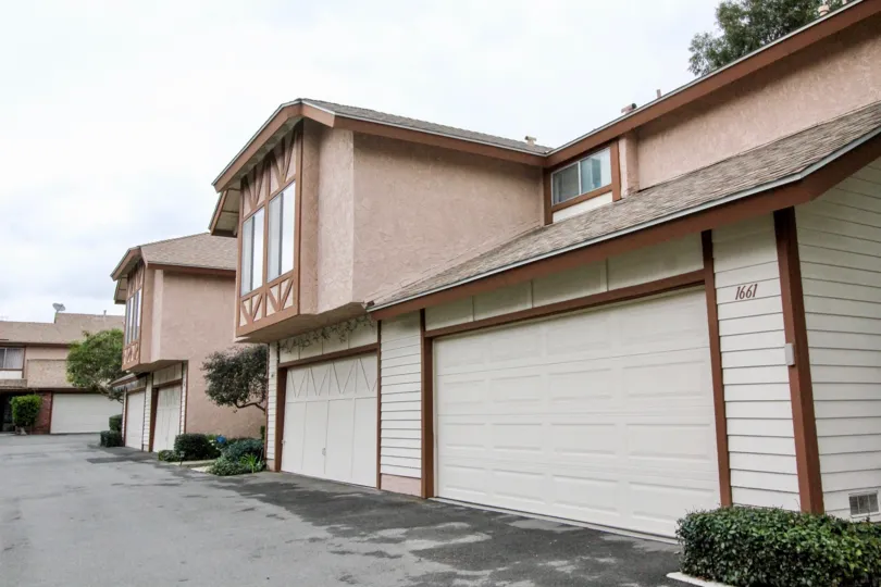 Highly Desired Bramble Village End Unit that Feels Like a Single Family Home! Beautifully Appointed Throughout Including Cathedral Ceiling and Brick Fireplace in Living Room, Exotic Hardwood and Tile Flooring Downstairs, Designer Paint Colors, Central Air
