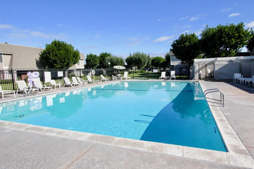 sunny day at the community pool of Broadmoor Arms in the city of Anaheim, california