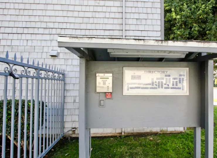 A shelter in the Brookhurst Village with a big gate.