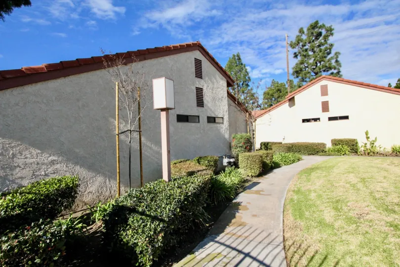 A group of houses along a narrow path in the Cameron Court community.