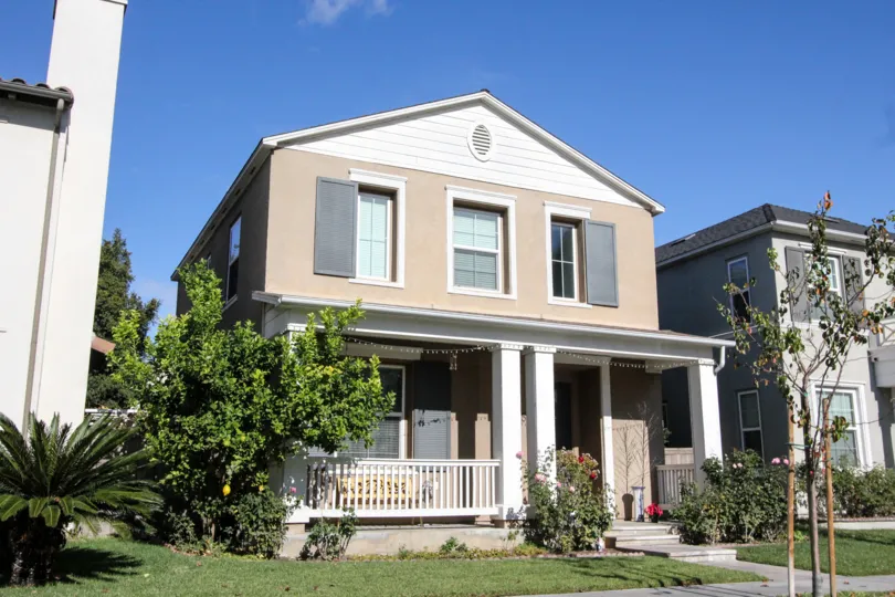 A sunny day in front of a single family home in Cantada Square.