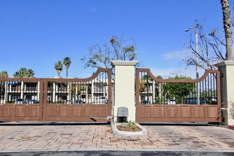 Sunny day showing the community gate of Cantada Square in the city of Anaheim, California