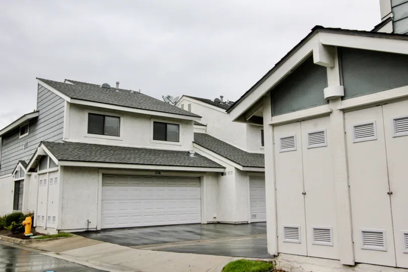 A sunny day in the area of Carbon Creek, outside, garage, roof, condo, door