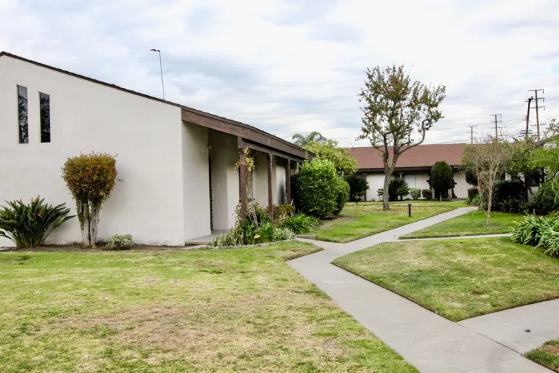 A white buildings with sidewalks in the Casa Emperador community in Anaheim, California.
