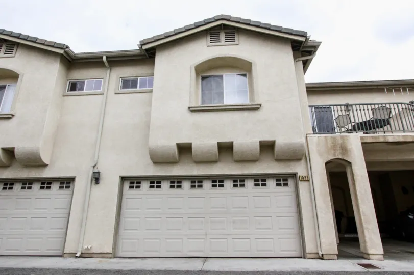 A front view of a two-storey unit in Citrus Villas community with decorative eaves.