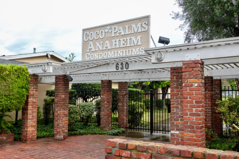THE 630 FLAT IN THE COCO PALMS WITH THE BRICKS WALL, PLANTS, TREES