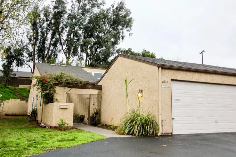 THIS IMAGE REPRESENTS THE SHED WITH BEAUTIFUL LAWN, ROADWAY ARE SEEN IN THE GATEWAY AMERICANA COMMUNITY