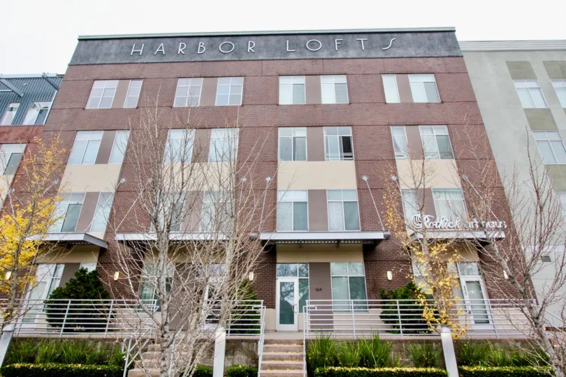 VERY TALL BUILDING OF HARBOR LOFTS WITH MORE WINDOWS WITHNICE BROWN COLOUR