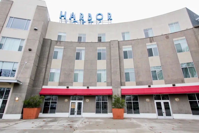 Nice Big Building with Many windows and name in Harbor Lofts of Anaheim