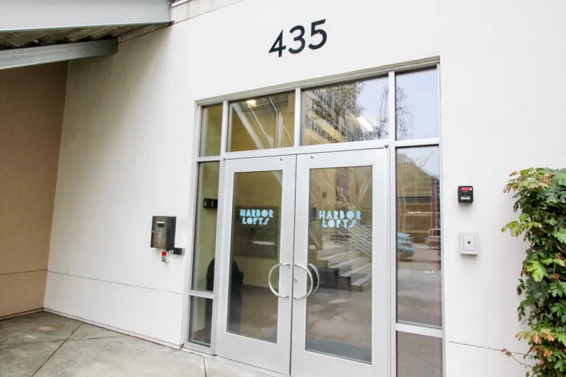 Building number 435 with a large entrance door in the Habor lofts community