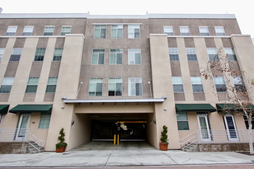 The front yard of a large residential complex inside Harbor Lofts community