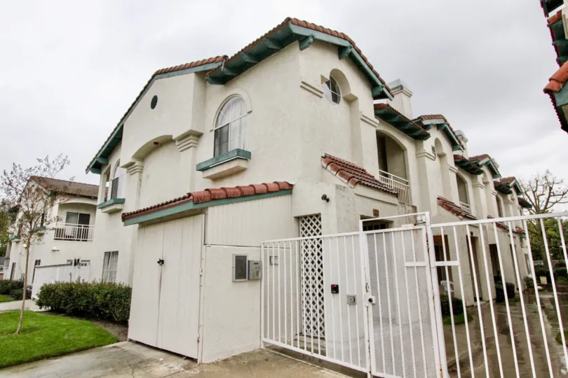 A series of two-storey houses in the La Vie En Rose community with hip roofs.