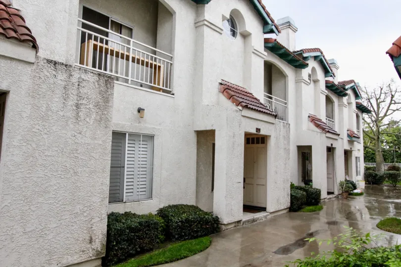 Nice view of villa with balconies on a rainy day in La Vie En Rose of Anaheim