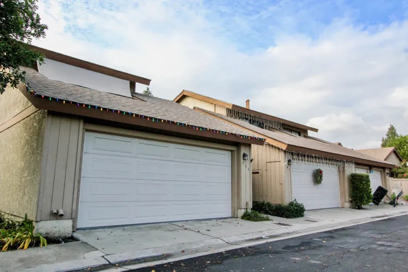 THE SHEDS WITH PLANTS AND THE ROAD WAY ARE THERE IN THE IMAGE IN ANAHEIM CITY