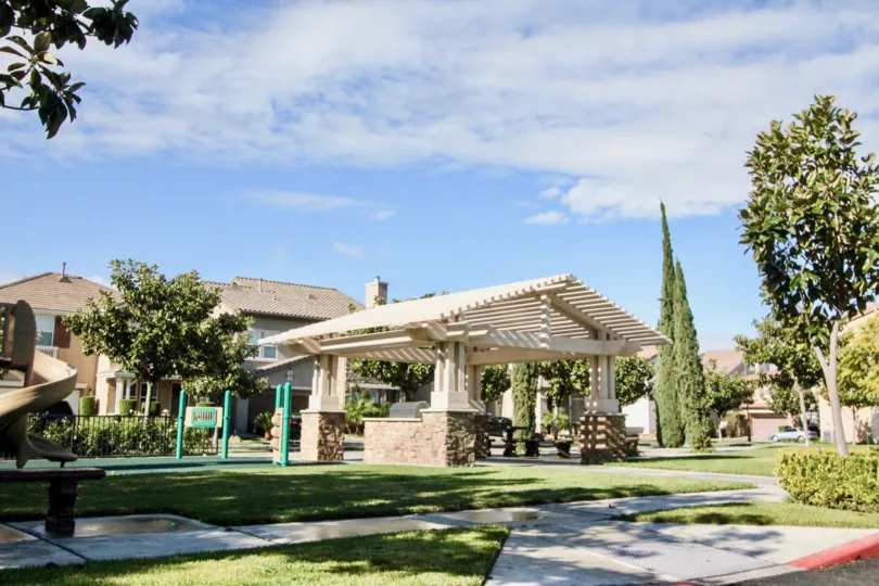 The portico of a building in the Magnolia Lane community