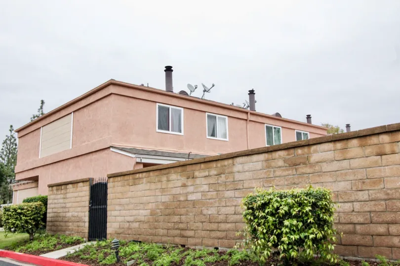 Fabulous view of villa with dish antennas and garden in Northwoods Village of Anaheim