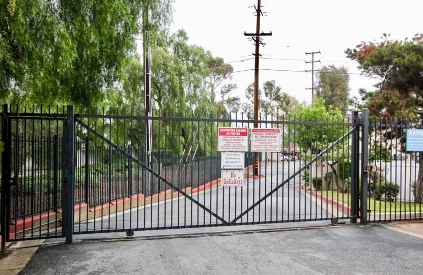 Excellent view of Main gate of a park with trees and electric lines in Pinetree Village of Anaheim