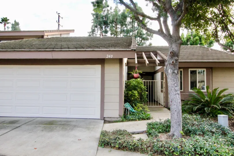 THE 240 APARTMENT IN THE PONDEROSA MEADOWS WITH THE SHUTTER, FLOWER POTS, TREES, PLANTS