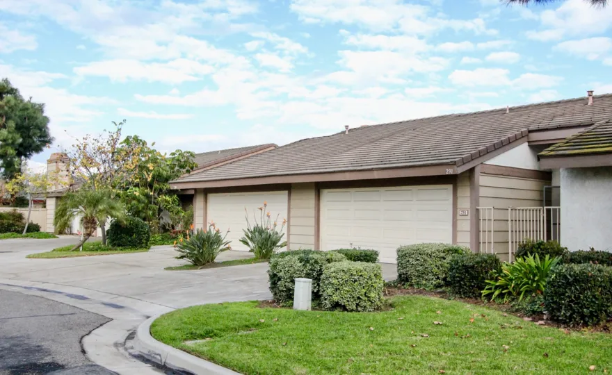 THIS IMAGE VIEWS THE SHEDS, LAWN WITH PLANTS, TREES, EMPTY SPACE ON THE FRONT ARE THERE IN ANAHEIM CITY