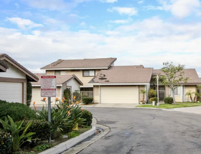 Excellent view of villas with road point and plants in Ponderosa Meadows of Anaheim