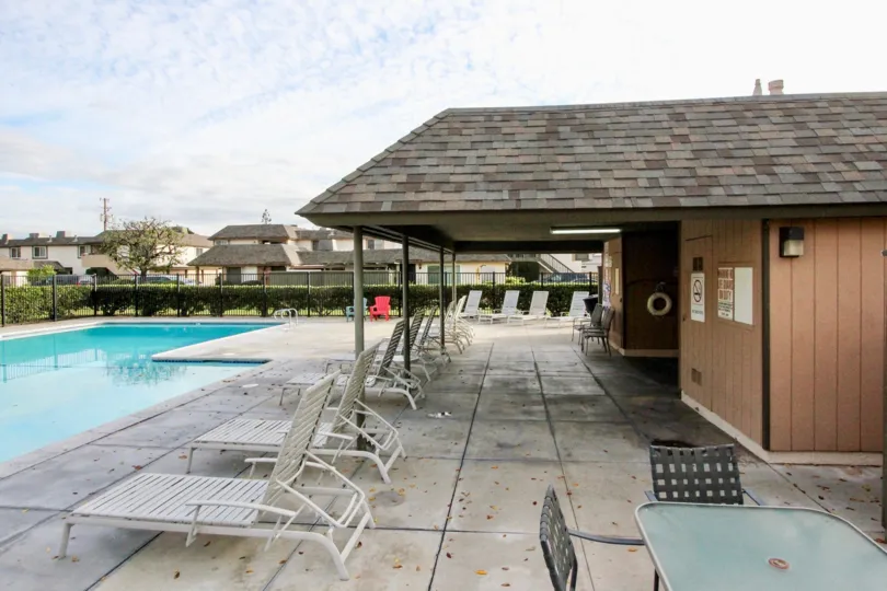 Excellent view of swimming pool with sitting in Ridgeway Park East of Anaheim