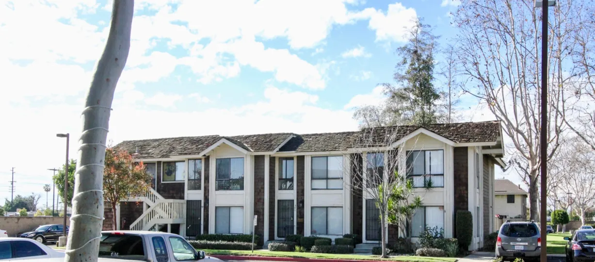 THE BUNGALOW IN THE SUTTER CREEK TOWNHOMES WITH THE CAR PARKING, PLANTS, TREES
