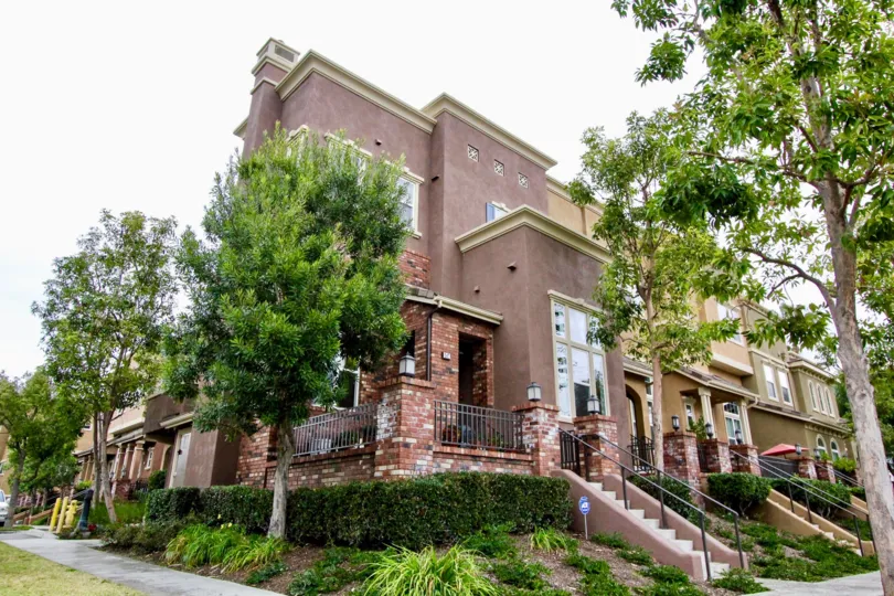 THE LARGE HOUSE WITH PLANTS, TREES ARE LOCATED IN ANAHEIM CITY