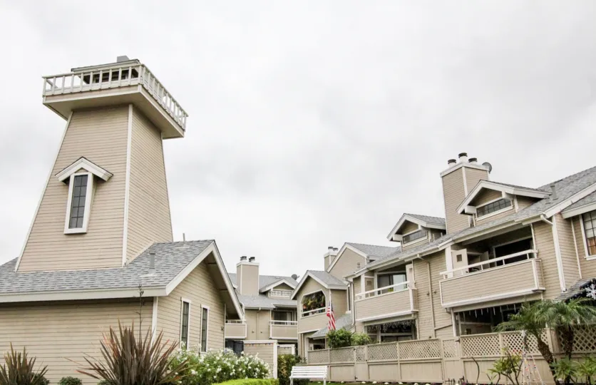 THIS APARTMENT IN ANAHEIM CITY, THAT SHOWS THE LOT OF PLANTS WITH FLOWERS, CROTON PLANTS ARE THERE