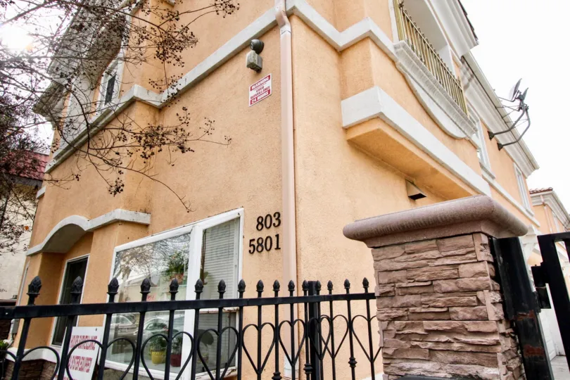 a warm day in the buena park villas with a building that has numbered as 803 and 5801