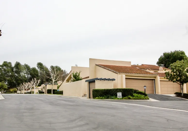 THIS IMAGE VIEWS THE SHEDS ROADWAY, TREES, PLANTS LOCATED IN BUENA PARK