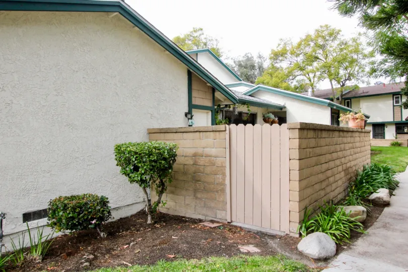 THIS IS THE SIDE VIEW OF THE VILLA WITH BEAUTIFUL LAWN, PLANTS, TREES LOCATED IN CAMERON PARK COMMUNITY
