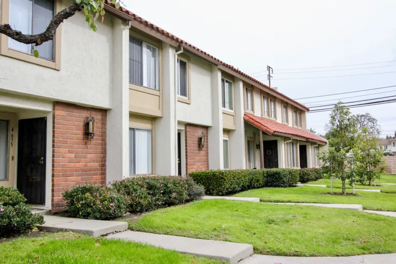 Attractive view of lawn near villas in Casitas California of Buena Park