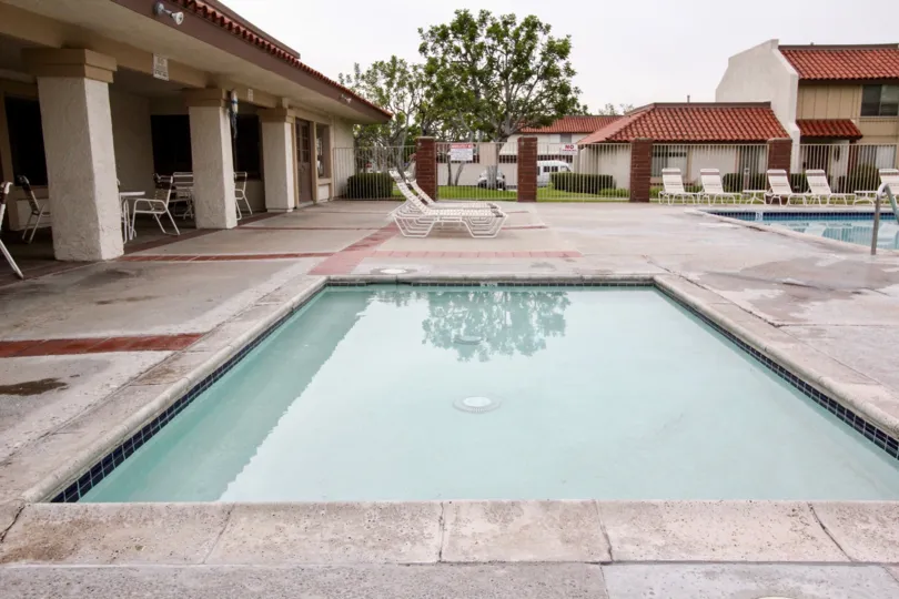 The place in Casitas California has both children's and adult's swimming pool with seating chairs