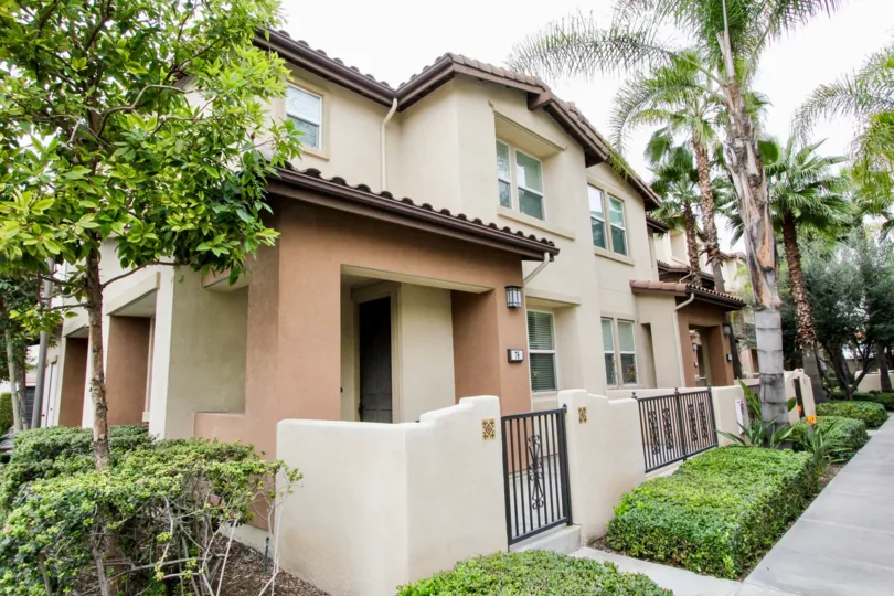 A residential apartment in the Founders Walk with gate and plants.