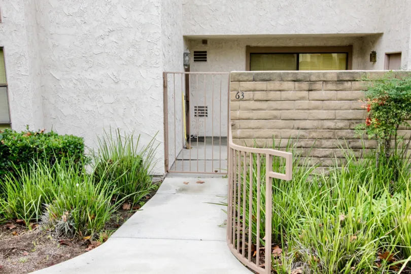 THE 63 FLAT IN THE LOS COYOTES VILLAGE WITH THE GRSSES, PLANTS