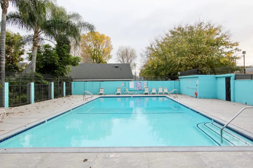 A lovely blue community swimming pool in Monticello Townhomes in Buena Park