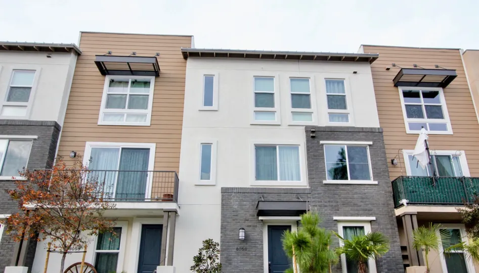 A residential apartment in THe Parker Collection with glass windows.