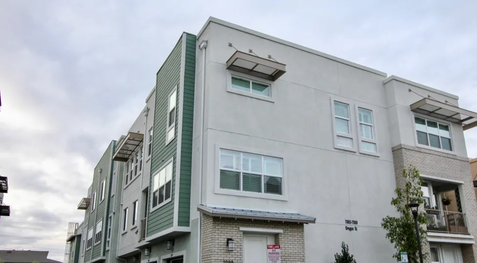 Excellent view of villa with glass doors and balcony in The Parker Collection of Buena Park