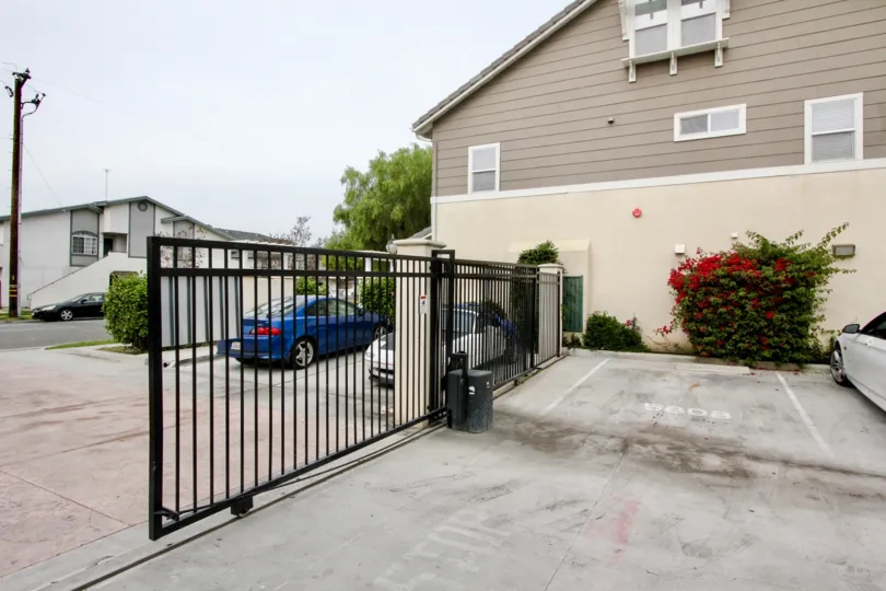 Car is parking at outside the gate of apartment in Trellis lane
