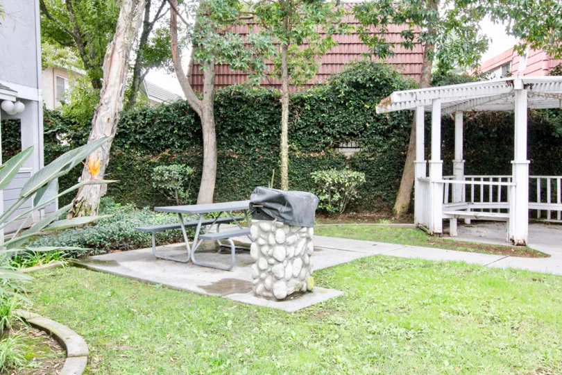 A gazebo anf grill and picnic area in a backyard in Western Bay Estates in Buena Park