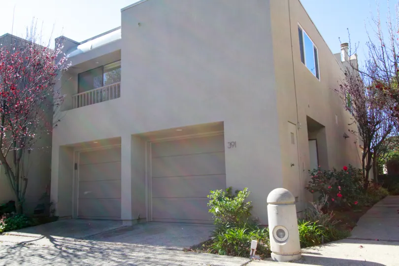A huge building in the Bay View Terrace is very elegant with trees, plats, flowers and also with clean street.